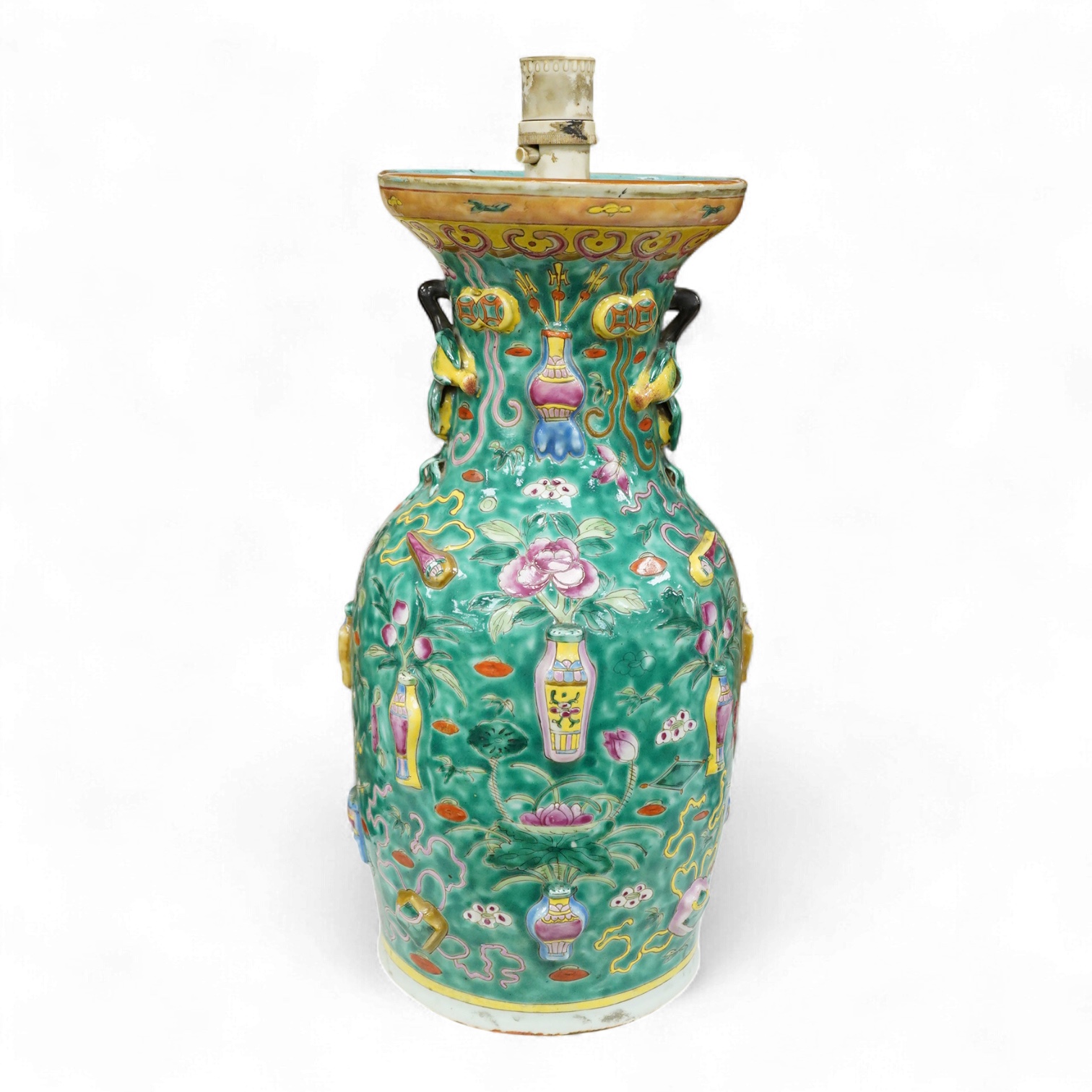 A late 19th century Chinese enamelled porcelain green ground vase with relief decoration, mounted as a lamp, 48cm high overall